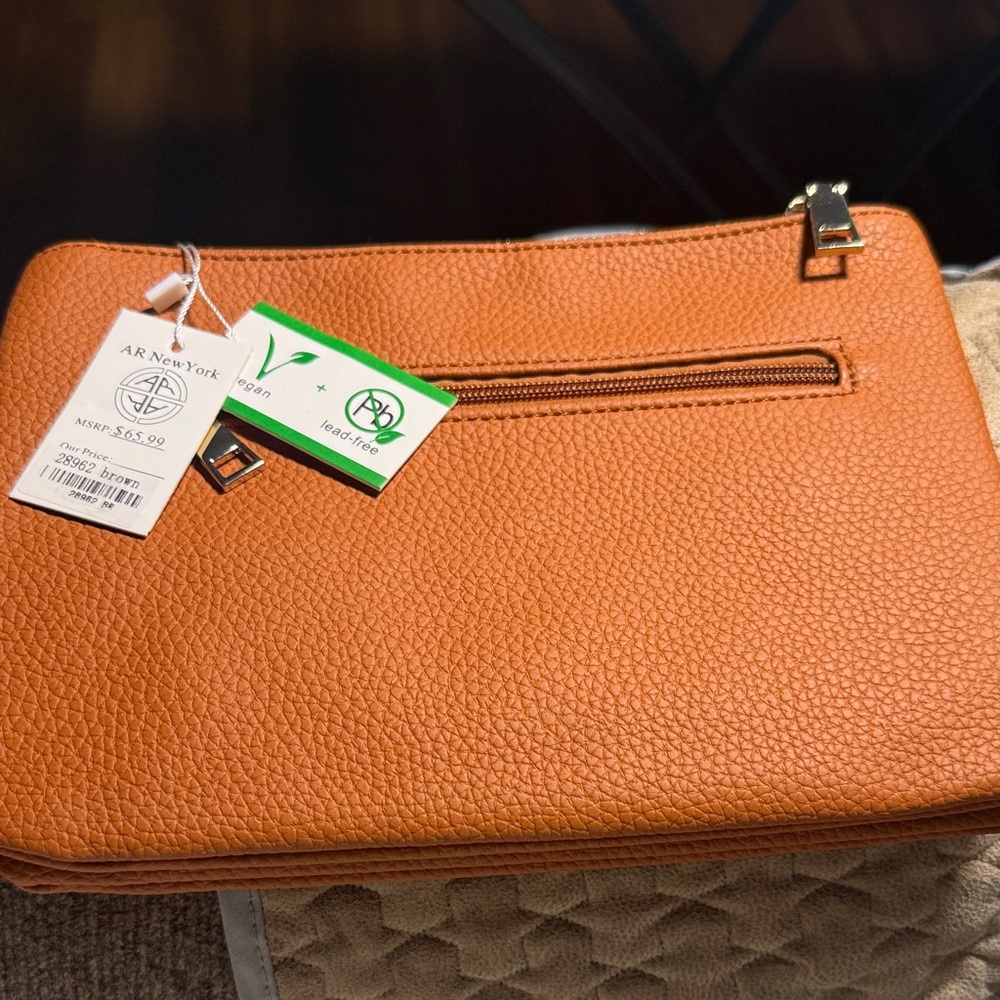 AR New York brown Clutch, wristlet or crossbody